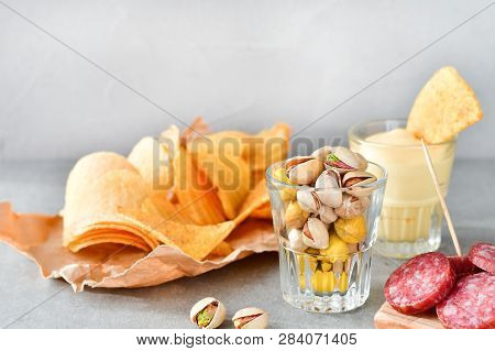 Aperitif Snacks At The Bar.relax In The Bar With Friends, Beer Party.  Selective Focus And Copy Spac