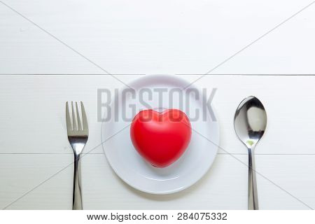 Red Heart With Love And Dish And Spoon And Fork On Wooden Background, 14 February Valentine Day, On 