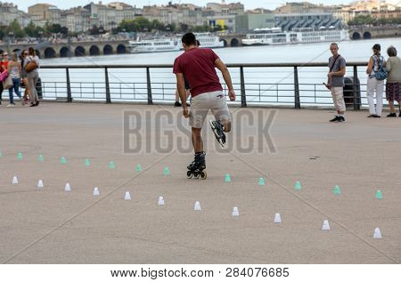 Bordeaux, France - September 9, 2018: Roller Skater Performs Acrobatics In Quai Lousi Xviii In Borde