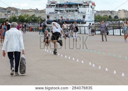 Bordeaux, France - September 9, 2018: Roller Skater Performs Acrobatics In Quai Lousi Xviii In Borde