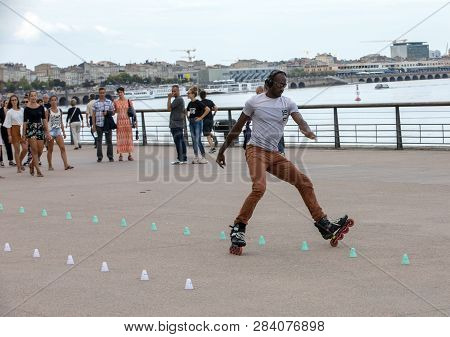 Bordeaux, France - September 9, 2018: Roller Skater Performs Acrobatics In Quai Lousi Xviii In Borde
