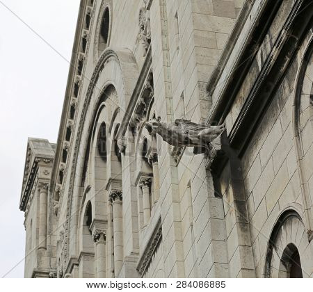 Gargoyle Of The Facade Of The Church Of Notre Dame In Paris, France