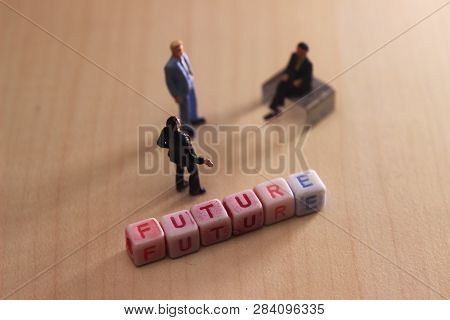Top View Mini Figure Toy Two Businessman Talking About Their Future Organization Or Corporate
