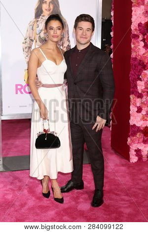 LOS ANGELES - FEB 11:  Chloe Bridges, Adam DeVine at the 