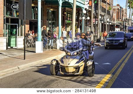 Ybor City Tampa Bay, Florida. January 19 , 2019  Nice Couple Enjoy Ride In Motocycle At 7th Ave.