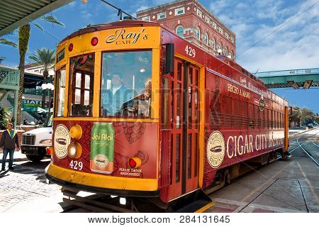 Ybor City Tampa Bay, Florida. January 19 , 2019 . Colorful Streetcar On Cloudy Sky Background.