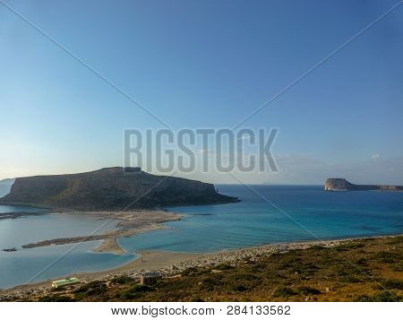 Famous Lagoon Of Balos Beach With White Sand And Exotic Blue And Turquoise Waters On Crete Island, G