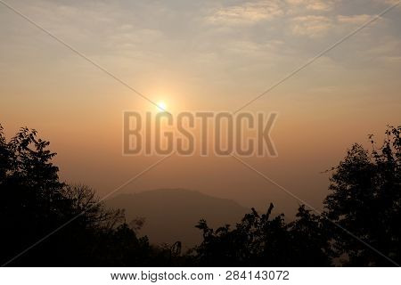 Morning Mist In The Doi Ang Khang Mountain Peaks On Natural Landscape. Green Valley On Background Fo