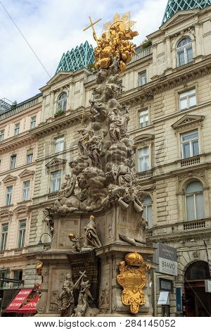 VIENNA, AUSTRIA - JUNE 27, 2015: Monumental Plague column (Pestsaule) on Graben street. The Graben i