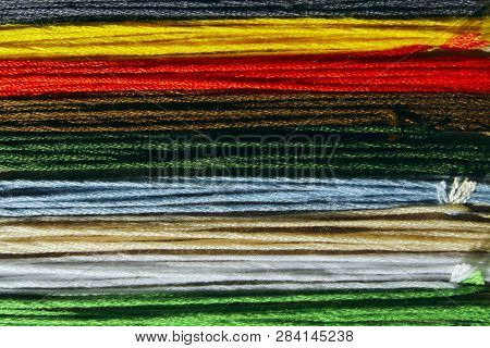 Abstract Colorful Background Texture. Cropped Shot Of Colorful Cotton Threads.