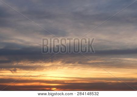 Sunset Sky With Lighted Clouds