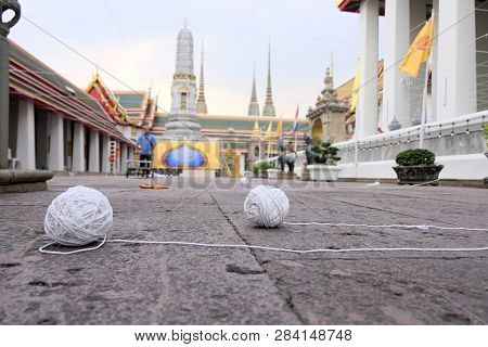 White Sacred Rope Ball On The Temple Floor,white Sacred Rope Is A Symbol Of Prayer That Plays An Imp