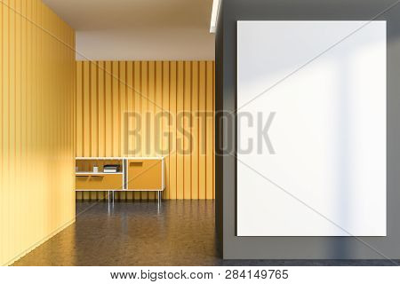 Empty Living Room Interior With Yellow And Gray Walls, Concrete Floor And Yellow Cabinet With Folder
