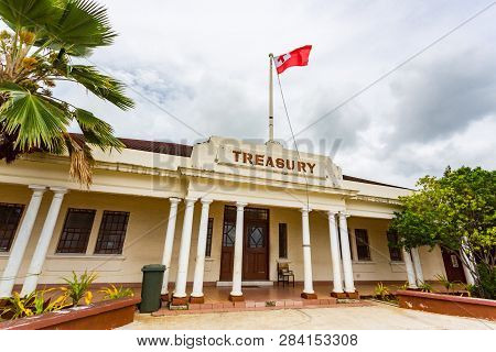 Historic Stone National Treasury Building, The Centre Of Nukualofa Or Nuku'alofa City. Red White Cro