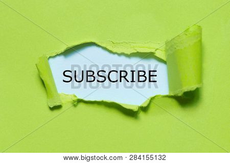 Ufo Green Torn Paper Written With Subscribe.