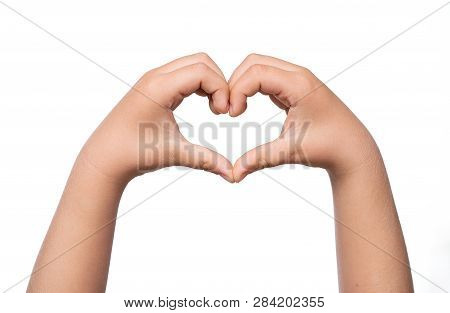 Close Up Of Child Hands Formig Heart Shape Isolated On White Background