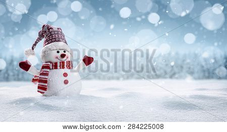 Panoramic View Of Happy Snowman In Winter Secenery With Copy Space
