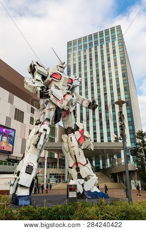 Tokyo, Japan - October 18, 2018: Full-size Mobile Suit Rx-0 Unicorn Gundam Performances At Diver Cit