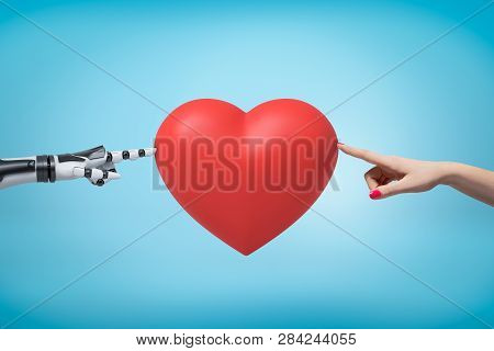 Womans Hand On The Right And Robots Hand On The Left Touching Red Valentine Heart With Their Fingert