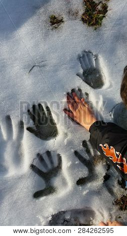 Handshakes On The Snow On Sunday In Winter