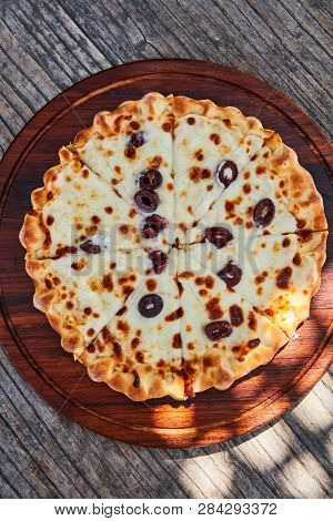 lebanese style flatbread with cheese and olive