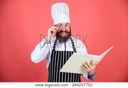 Amateur Cook Read Book Recipes. Culinary Arts Concept. Man Learn Recipe. Try Something New. Cookery 