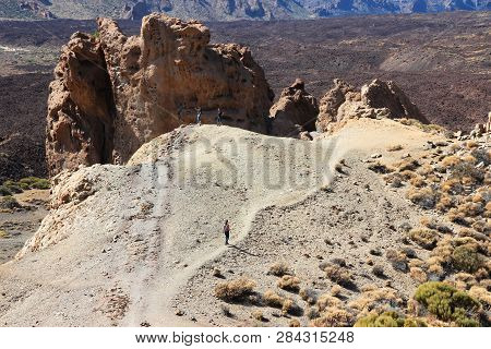 Tenerife, Spain - October 29, 2012: Tourists Visit Volcanic Landscape Of Teide National Park In Tene