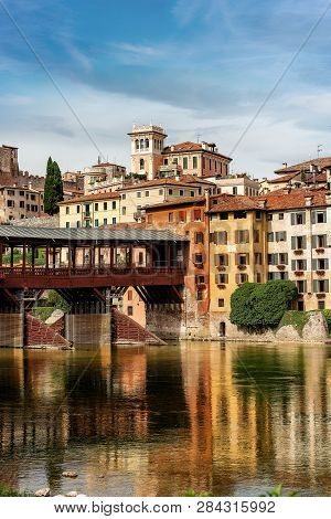 The Old Town Of Bassano Del Grappa With The River Brenta And The Ponte Degli Alpini Or Ponte Vecchio