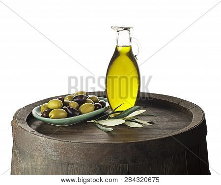 Bottle Of Extra Virgin Healthy Olive Oil With Barrel On White Background