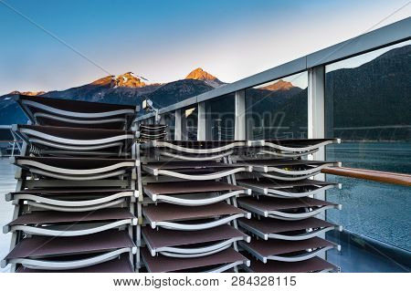 Stacked Flat Lounge Crusie Ship Deck, Morning, Sunlight On Mountains, Alaska.
