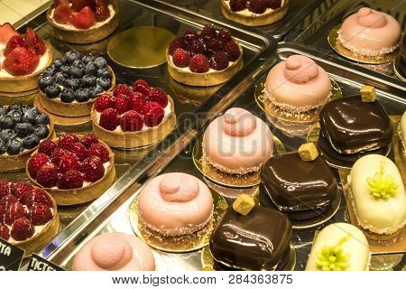 Multi-colored, Different And Tasty Cakes On A Show-window In Cafe. For Every Taste. Big Assortimt Sw