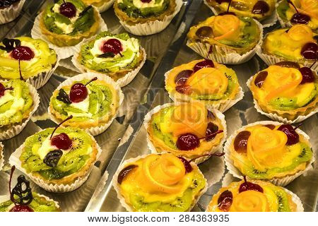 Multi-colored, Different And Tasty Cakes On A Show-window In Cafe. For Every Taste. Big Assortimt Sw