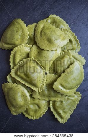 Mezzelune Green Fresh Pasta With Gorzonzola, Speck And Caramelised Onion. Closeup
