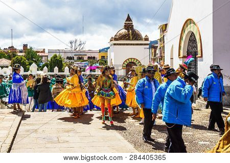 Cocacabana, Bolivia 30th April 2017: View On Group Of Local People Celebrating Parade And Playing Dr