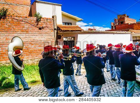 Cocacabana, Bolivia 30th April 2017: View On Group Of Local People Celebrating Parade And Playing Dr