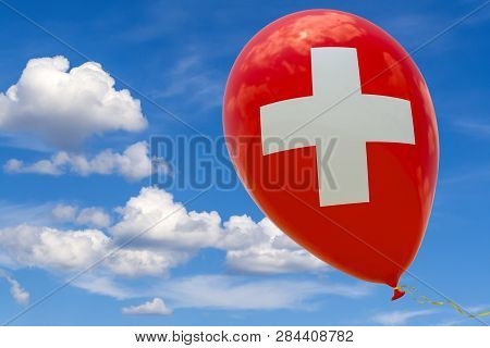 Balloon With The Image Of The National Flag Of Switzerland, Flying Through The Blue Sky. 3D Renderin