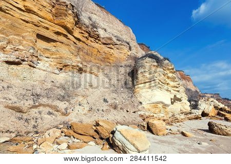 Rockslide. Mountain Landslide In An Environmentally Hazardous Area. Large Cracks In Earth, Descent O