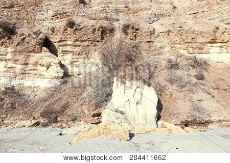 Rockslide. Mountain Landslide In An Environmentally Hazardous Area. Large Cracks In Earth, Descent O