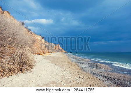 Rockslide. Mountain Landslide In An Environmentally Hazardous Area. Large Cracks In Earth, Descent O