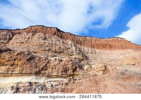 Rockslide. Mountain Landslide In An Environmentally Hazardous Area. Large Cracks In Earth, Descent O