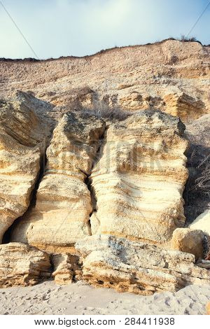 Rockslide. Mountain Landslide In An Environmentally Hazardous Area. Large Cracks In Earth, Descent O