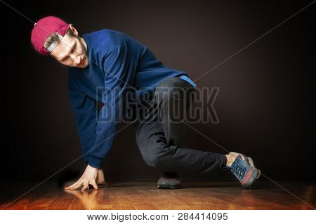 Attractive Male Street Dancer Perform Break Dance Footwork