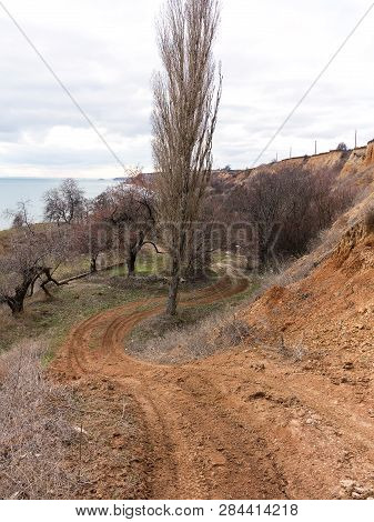Rockslide. Mountain Landslide In An Environmentally Hazardous Area. Large Cracks In Earth, Descent O