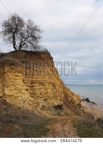 Rockslide. Mountain Landslide In An Environmentally Hazardous Area. Large Cracks In Earth, Descent O