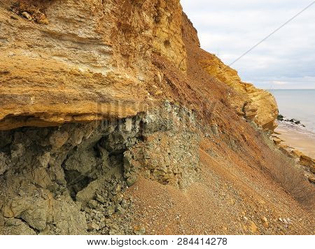 Rockslide. Mountain Landslide In An Environmentally Hazardous Area. Large Cracks In Earth, Descent O