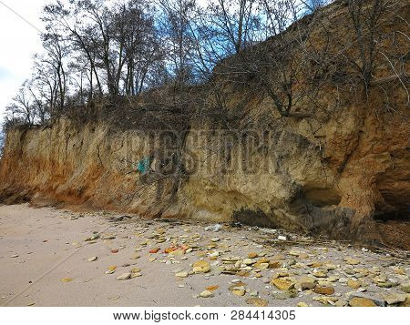 Rockslide. Mountain Landslide In An Environmentally Hazardous Area. Large Cracks In Earth, Descent O