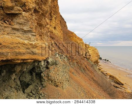 Rockslide. Mountain Landslide In An Environmentally Hazardous Area. Large Cracks In Earth, Descent O