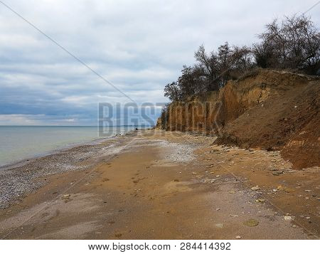 Rockslide. Mountain Landslide In An Environmentally Hazardous Area. Large Cracks In Earth, Descent O