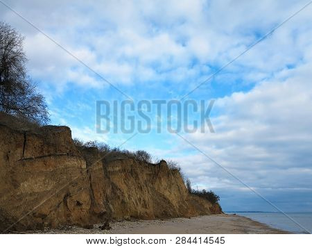 Rockslide. Mountain Landslide In An Environmentally Hazardous Area. Large Cracks In Earth, Descent O
