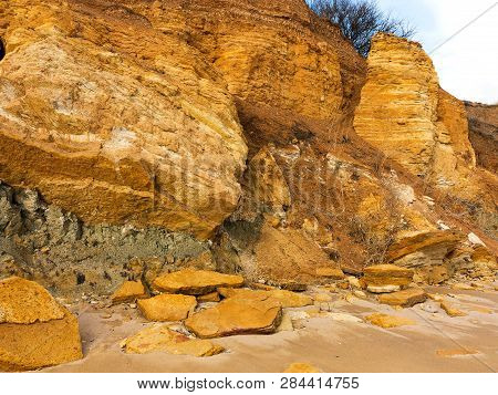 Rockslide. Mountain Landslide In An Environmentally Hazardous Area. Large Cracks In Earth, Descent O